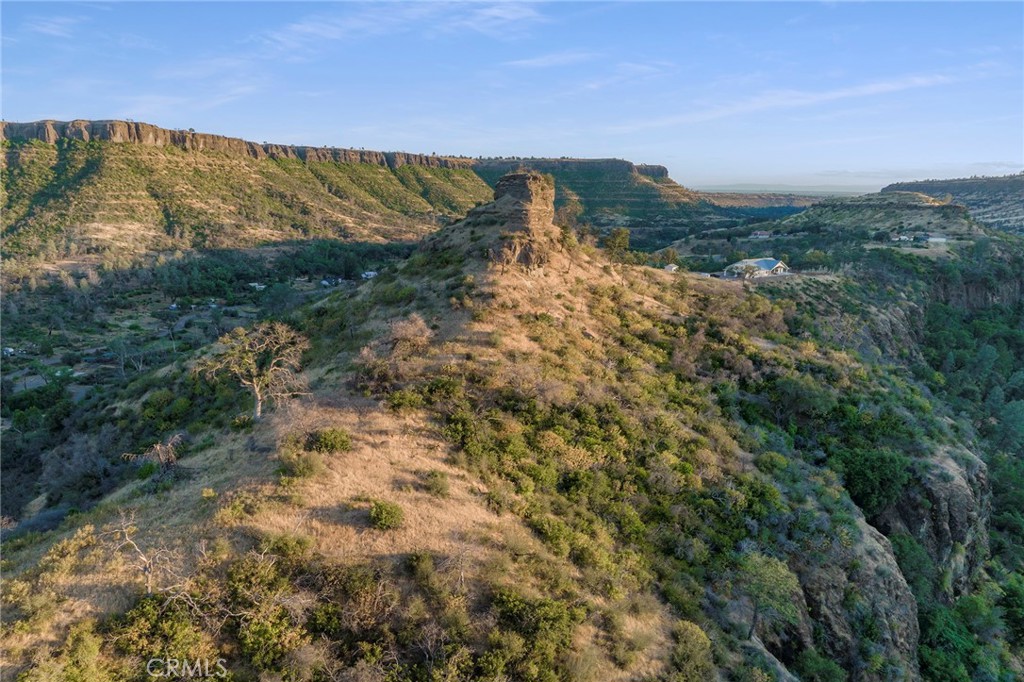 2470 Honey Run Road Chico, CA 95928 - Photo 38 of 71 a view of a lake with mountains in the background