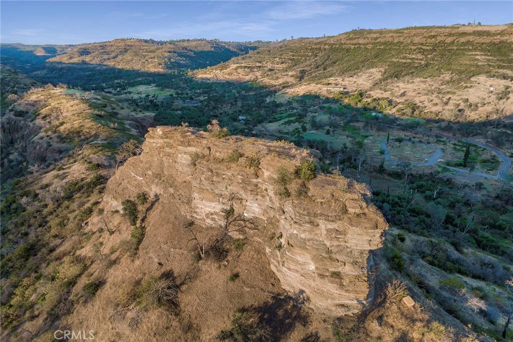 2470 Honey Run Road Chico, CA 95928 - Photo 39 of 71 a view of a lake with mountains in the background