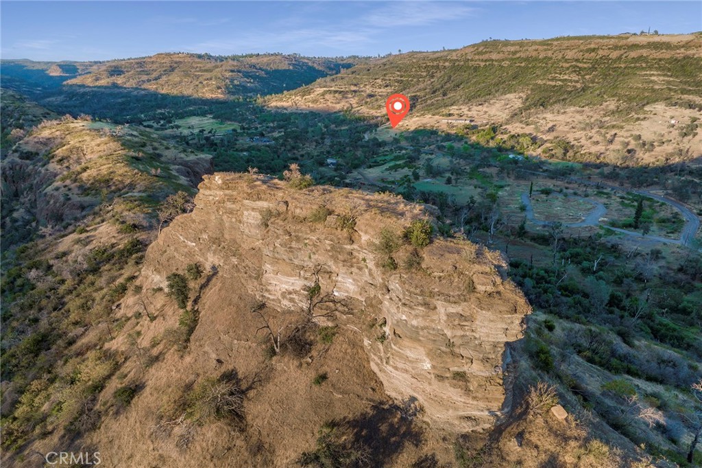 2470 Honey Run Road Chico, CA 95928 - Photo 40 of 71 a view of a yard with mountains in the background