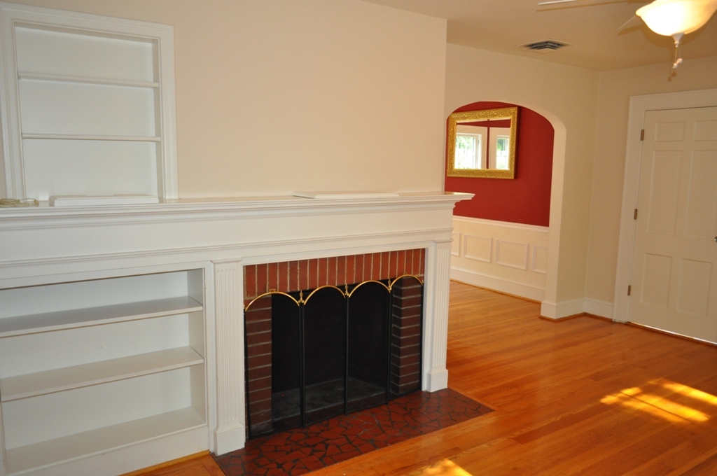 1822 Sheffield Road Southwest Roanoke, VA 24015 - Photo 10 of 49 Brick Fireplace with built-in bookcase