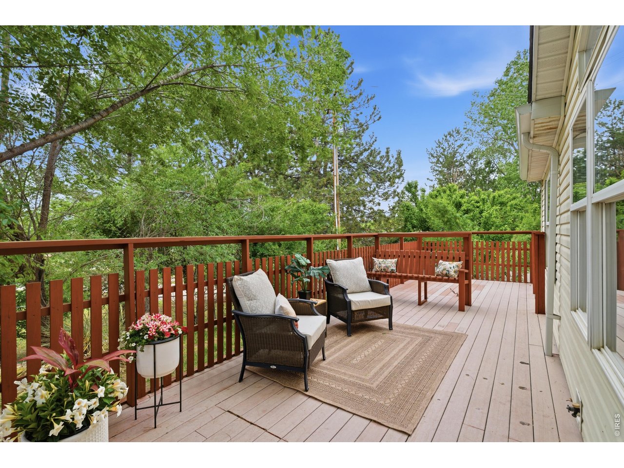 108 East Douglas Road Fort Collins, CO 80524 - Photo 5 of 38 Front deck area with hot tub space and electrical connection at the back