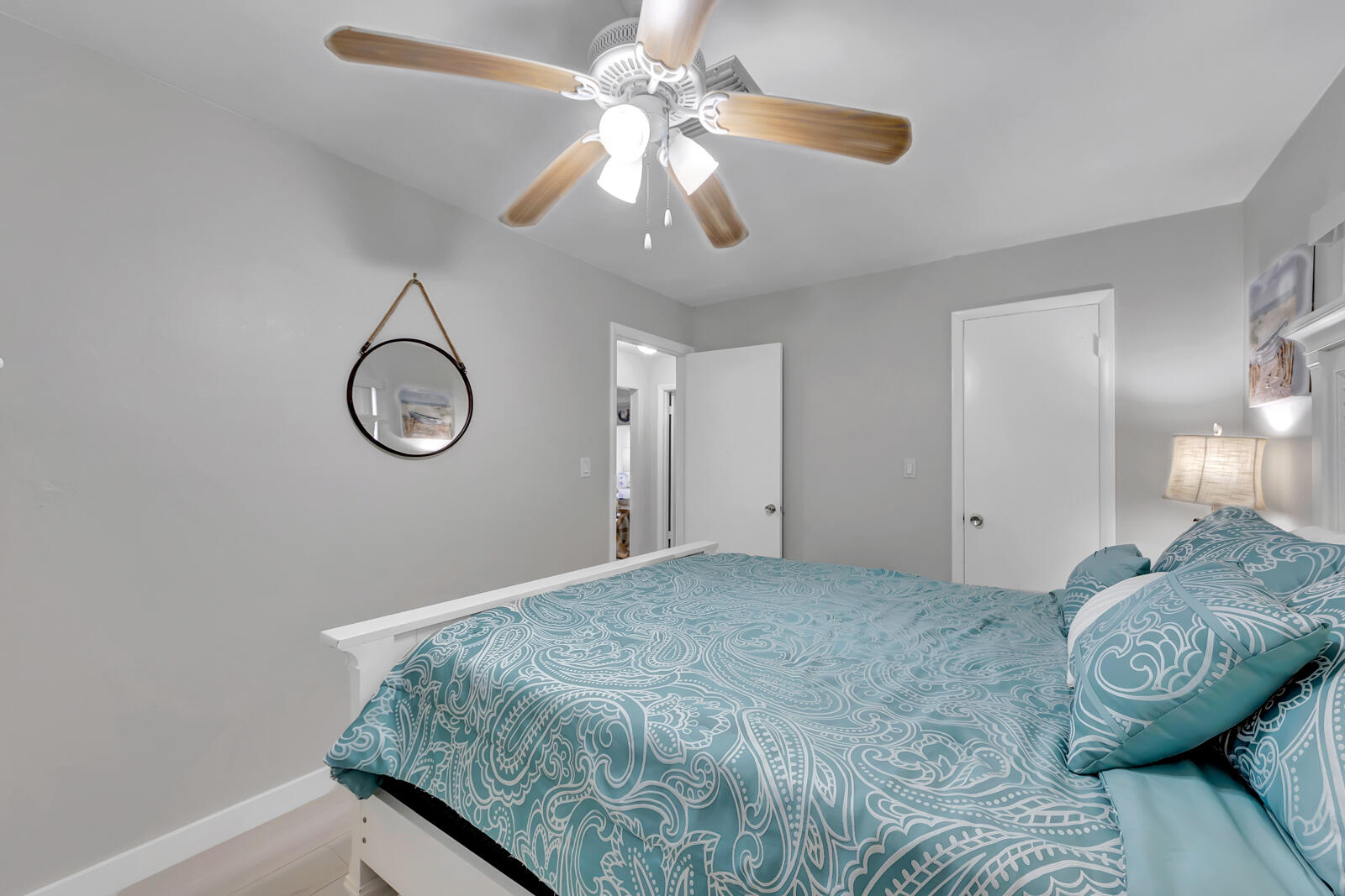 308 Sombrero Beach Road, Unit 1 & 3 Marathon, FL 33050 - Photo 16 of 36 a bedroom with a large bed and a chandelier