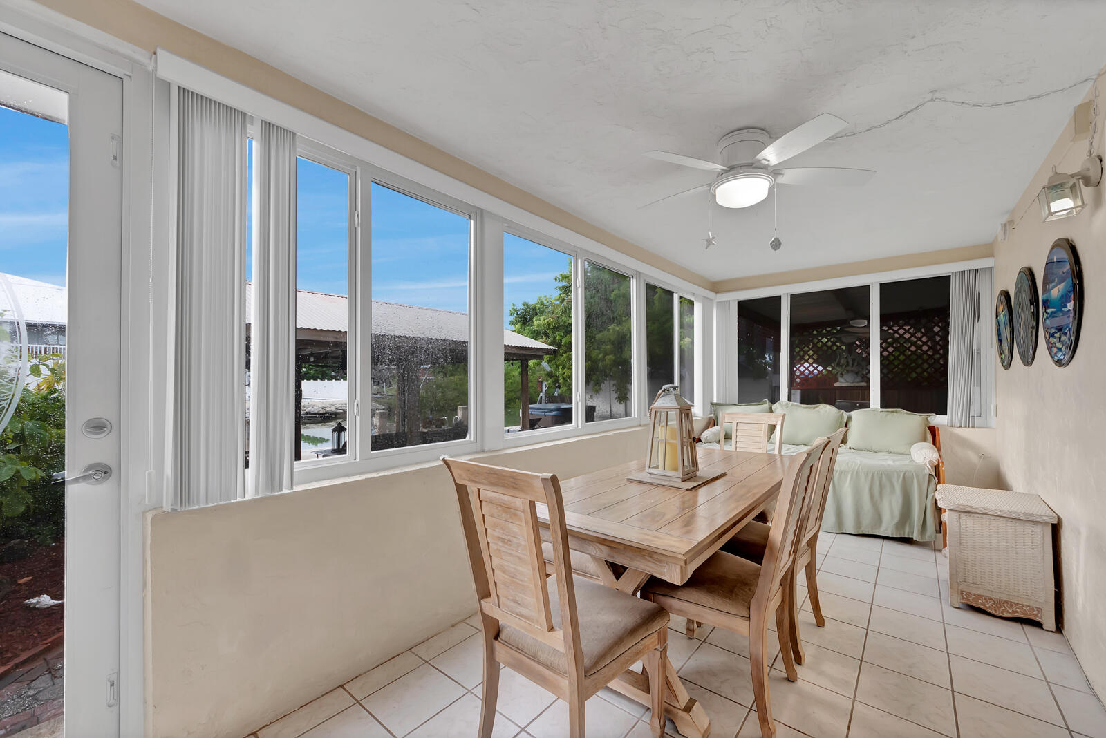 308 Sombrero Beach Road, Unit 1 & 3 Marathon, FL 33050 - Photo 24 of 36 a view of a dining room with furniture window and outside view