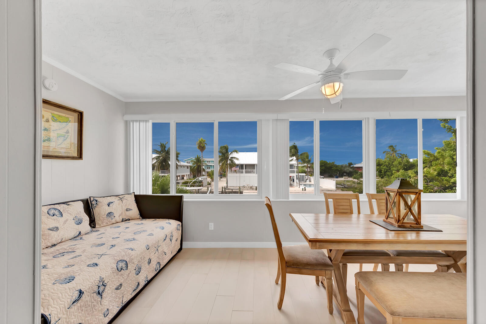 308 Sombrero Beach Road, Unit 1 & 3 Marathon, FL 33050 - Photo 7 of 36 a view of a dining room with furniture window and outside view