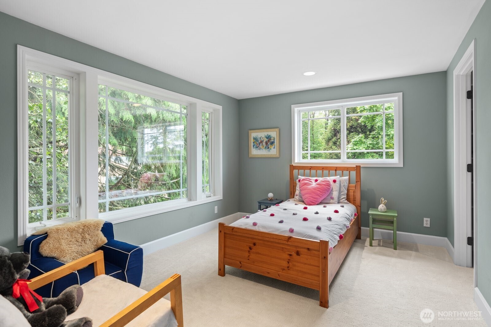 11404 239th Place Southwest Woodway, WA 98020 - Photo 21 of 40 a bedroom with a bed and windows