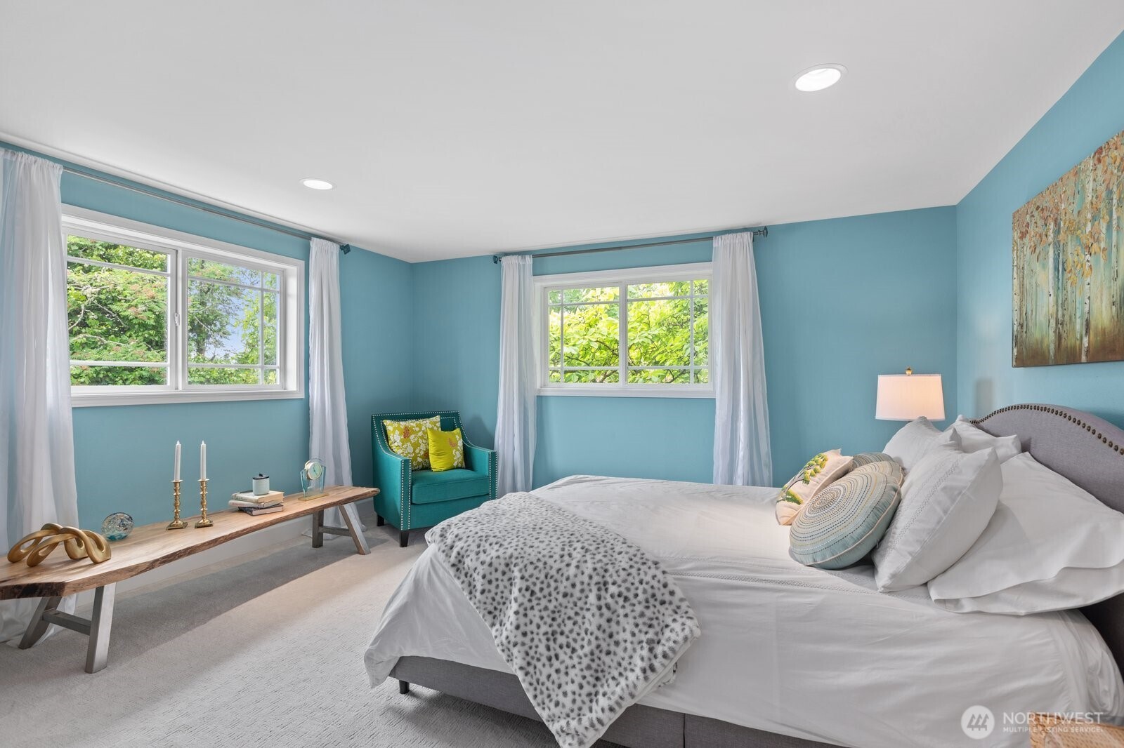 11404 239th Place Southwest Woodway, WA 98020 - Photo 22 of 40 a bedroom with a bed and painted walls