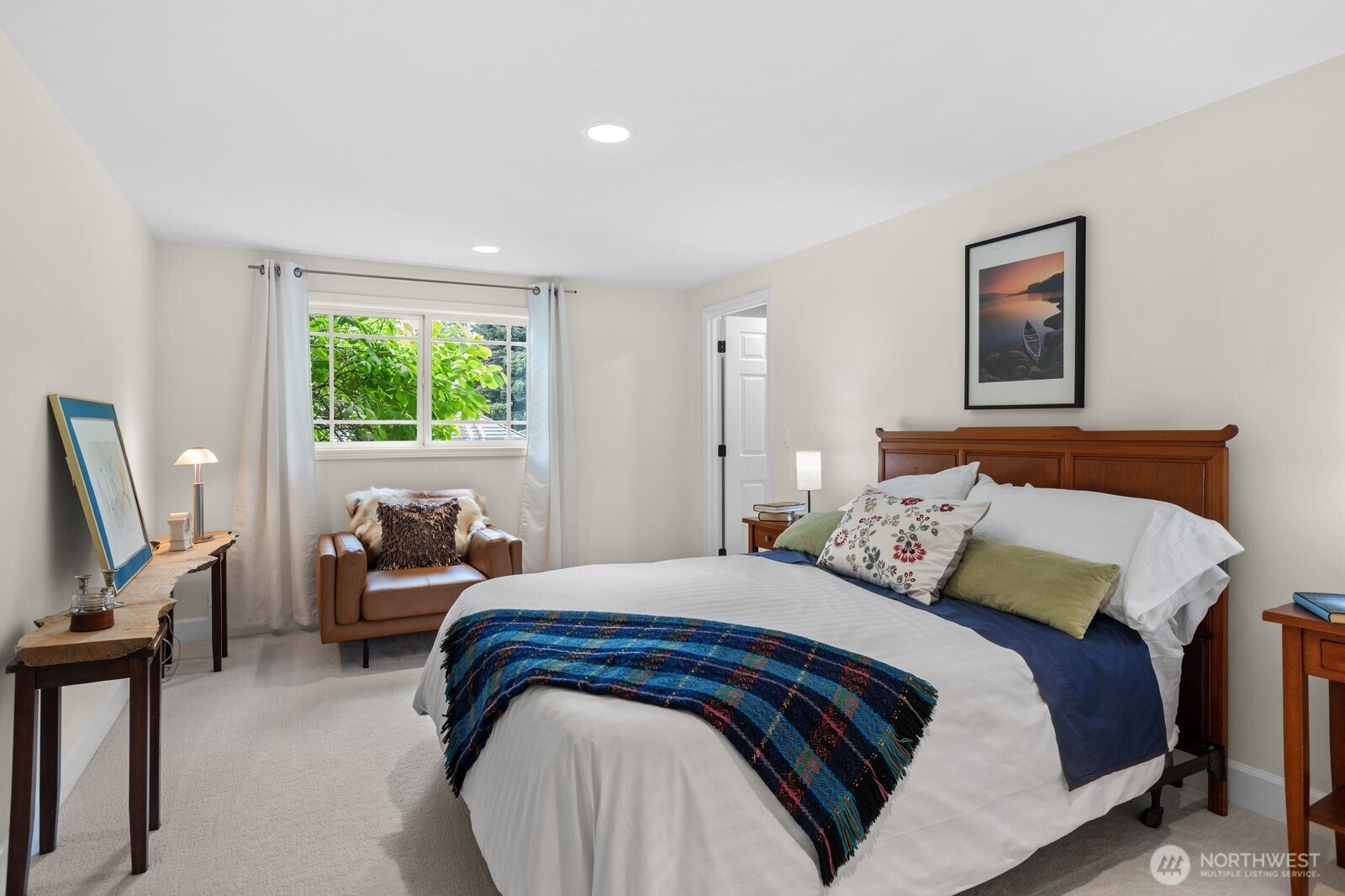 11404 239th Place Southwest Woodway, WA 98020 - Photo 23 of 40 a bedroom with a bed and a couch