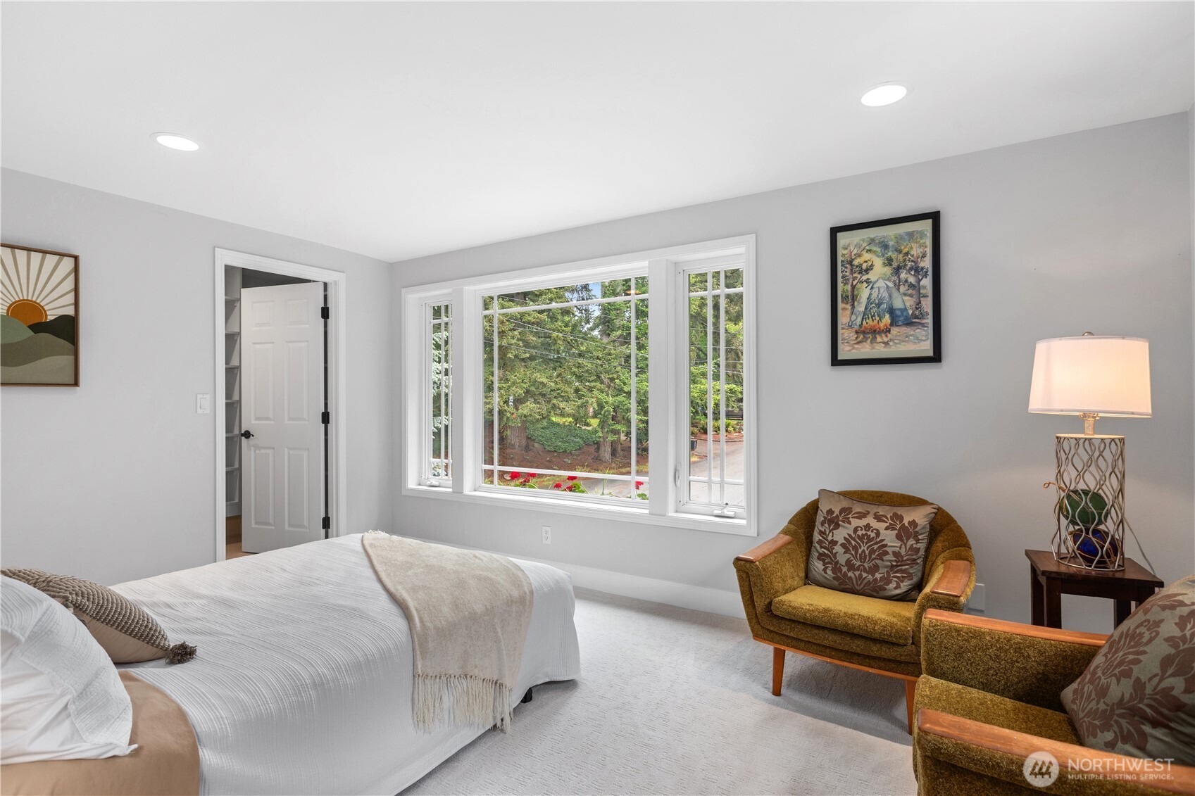 11404 239th Place Southwest Woodway, WA 98020 - Photo 24 of 40 a bedroom with furniture and a window