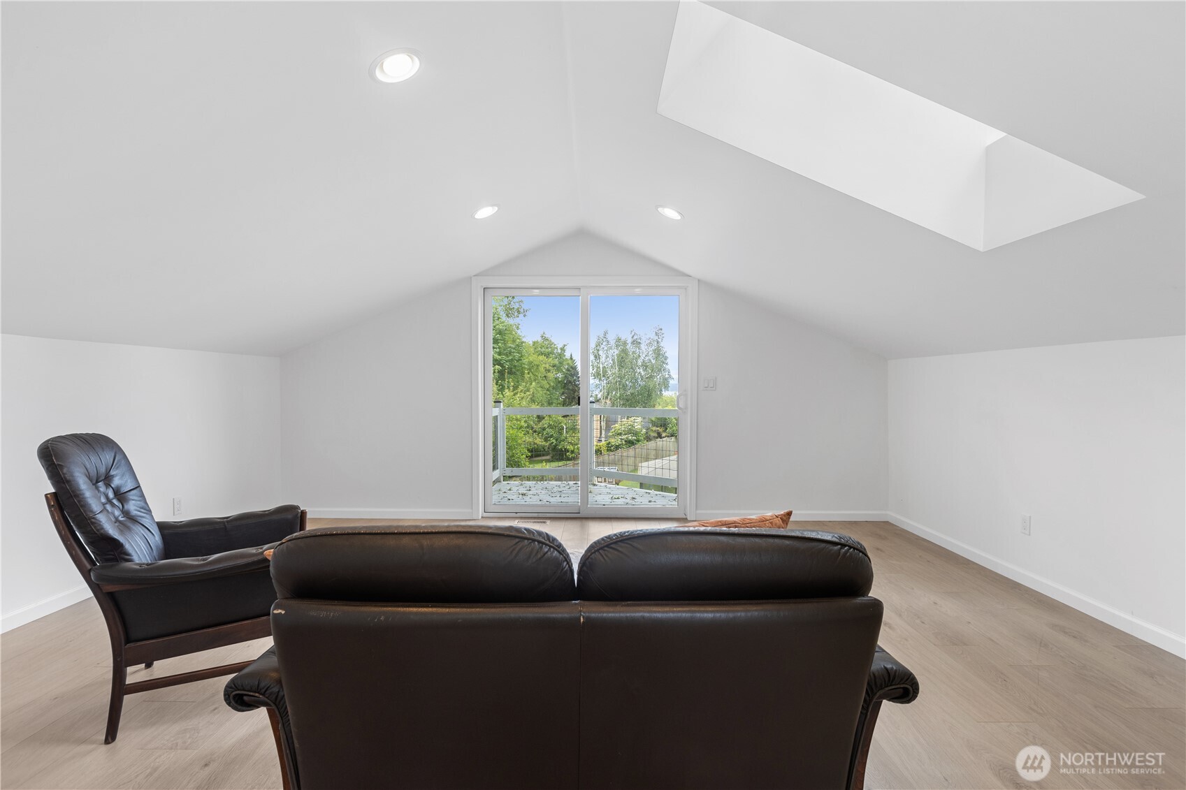 11404 239th Place Southwest Woodway, WA 98020 - Photo 33 of 40 a living room with furniture and a window