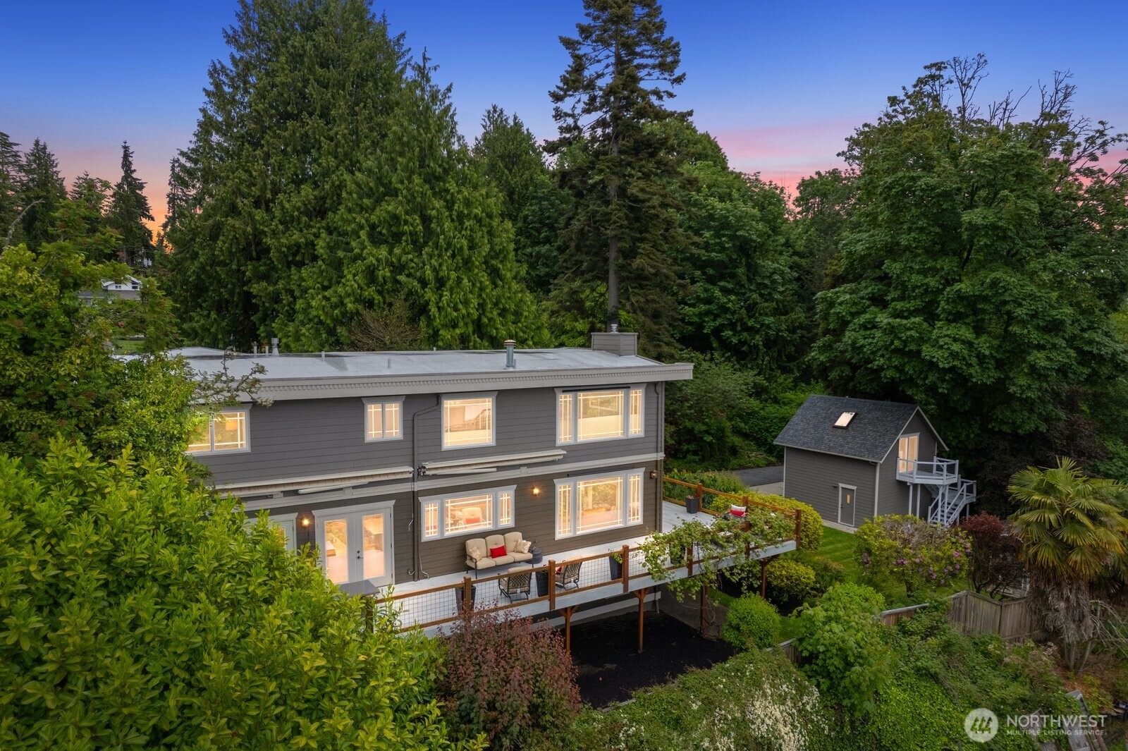 11404 239th Place Southwest Woodway, WA 98020 - Photo 38 of 40 front view of a house with a garden