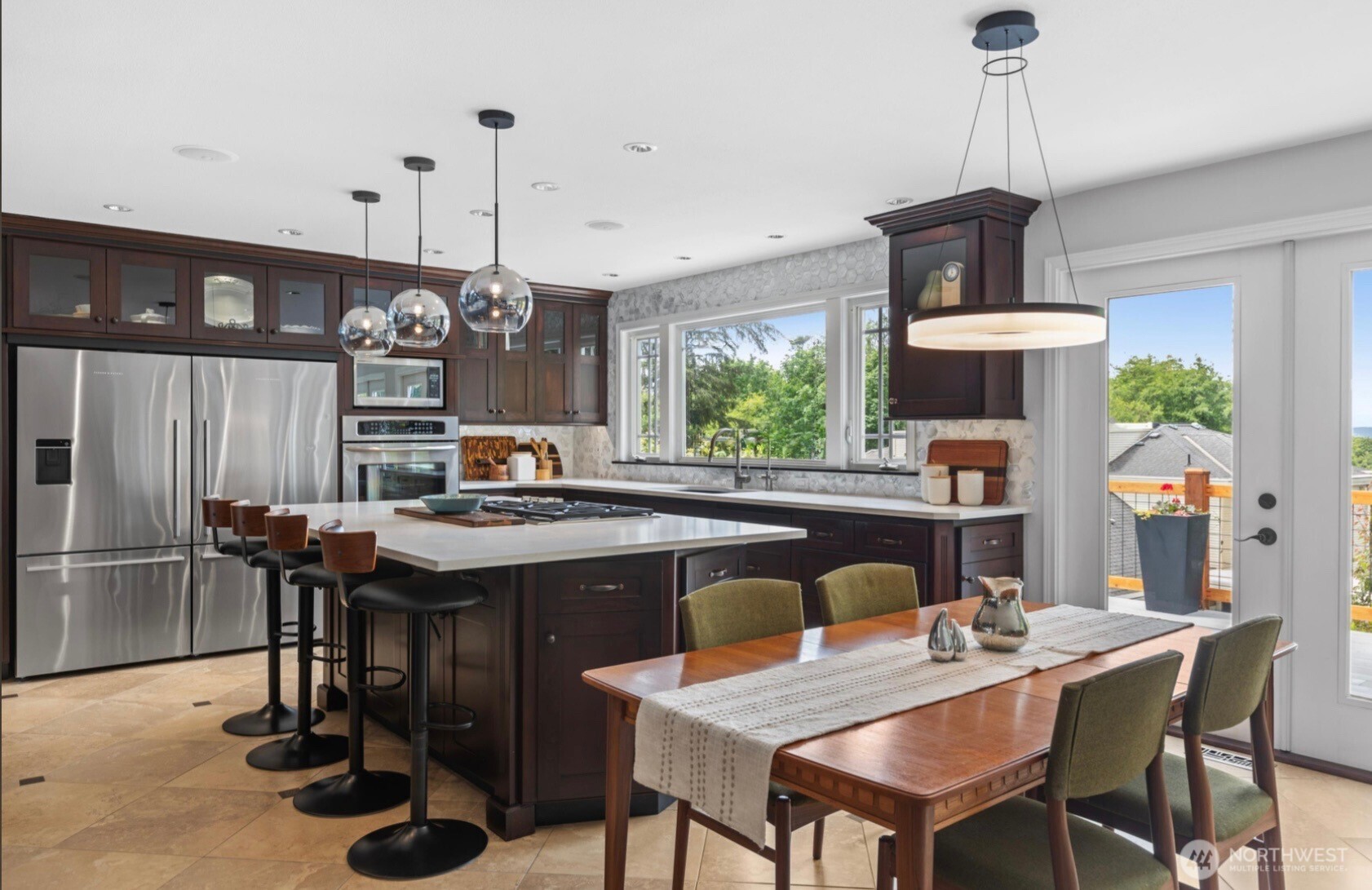 11404 239th Place Southwest Woodway, WA 98020 - Photo 8 of 40 a kitchen with a table and chairs
