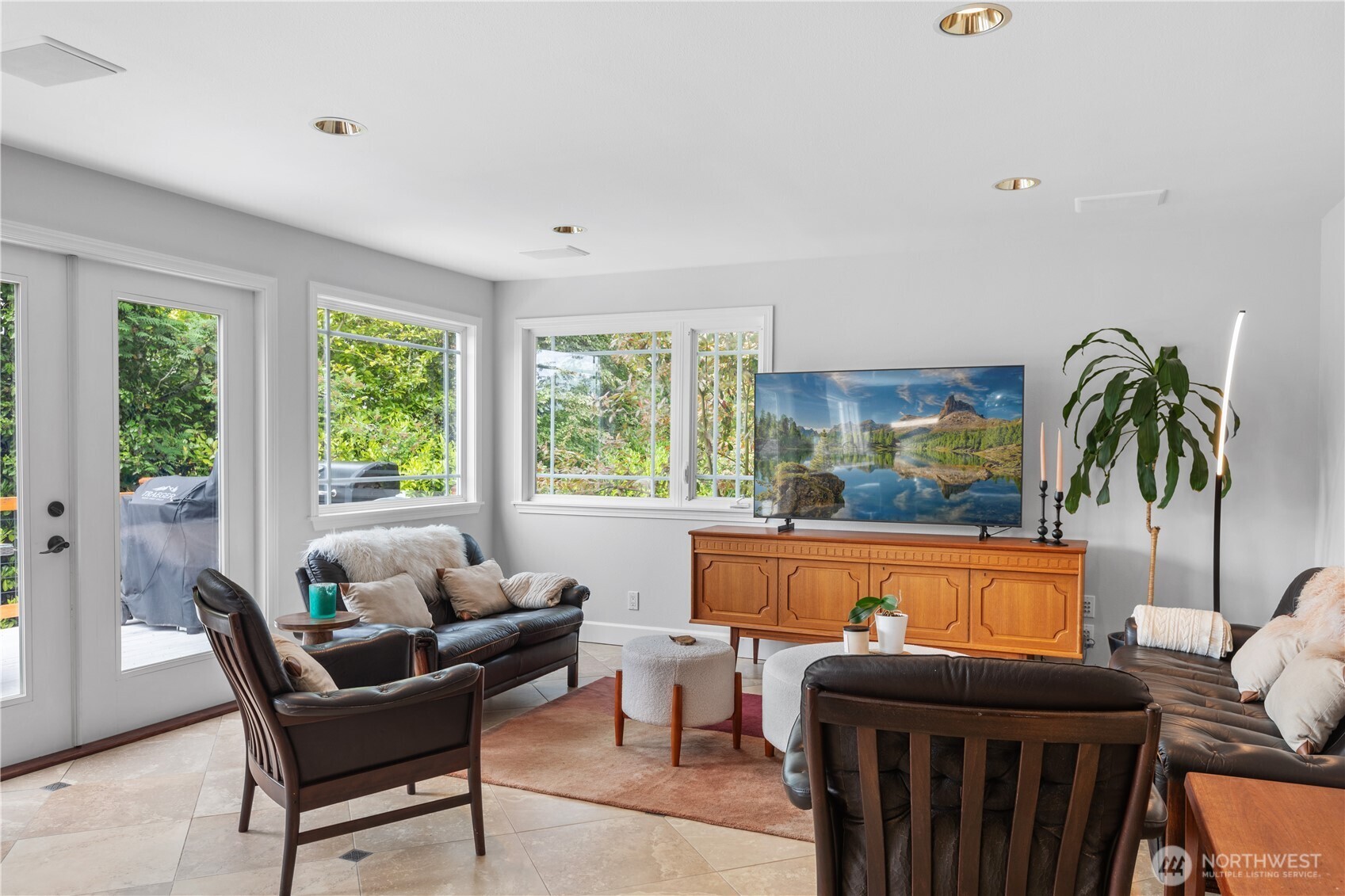 11404 239th Place Southwest Woodway, WA 98020 - Photo 9 of 40 a living room with furniture and a large window