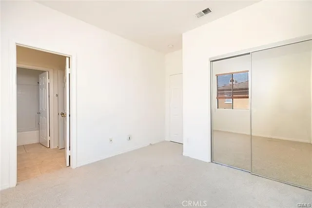 a bathroom with a sink a vanity and mirror