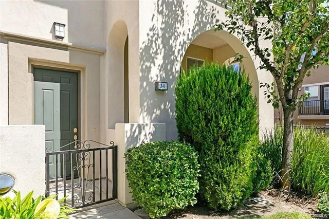 a view of a big yard with large trees