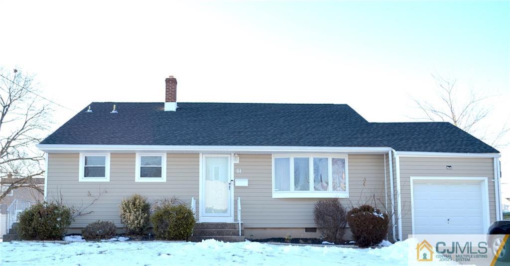 51 Eardley Road Edison, NJ 08817 - Photo 1 of 22 a front view of a house with a yard