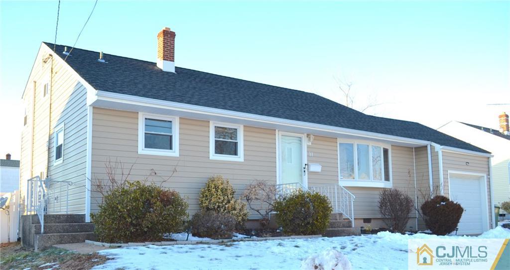 51 Eardley Road Edison, NJ 08817 - Photo 2 of 22 a front view of a house with garden