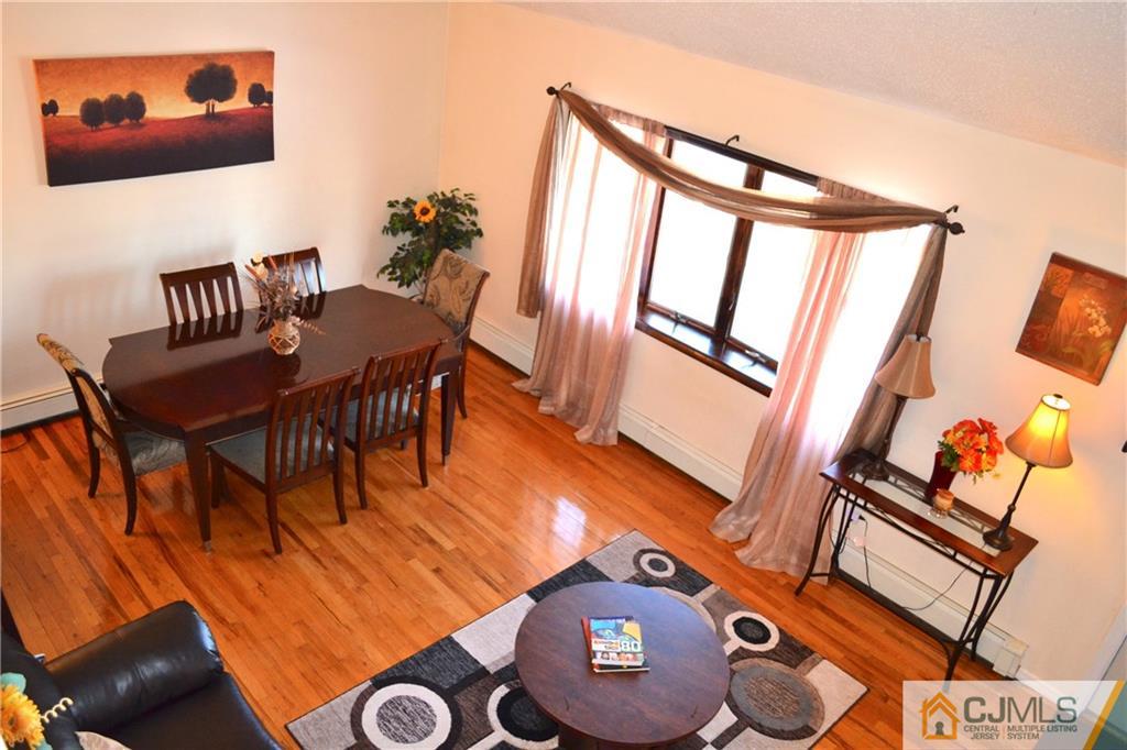 51 Eardley Road Edison, NJ 08817 - Photo 12 of 22 a view of a room with furniture and wooden floor