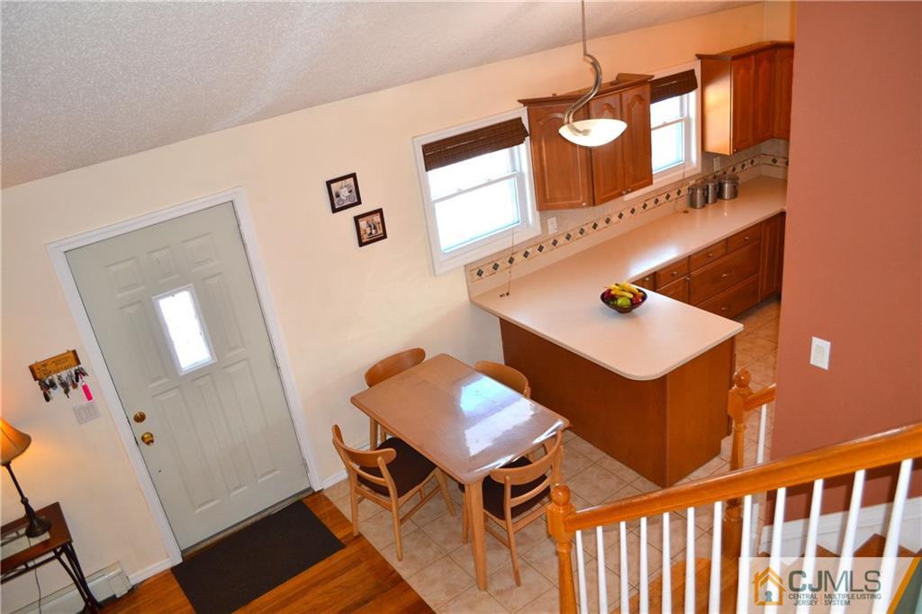 51 Eardley Road Edison, NJ 08817 - Photo 13 of 22 a view of a living room and dining room