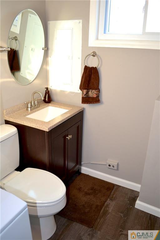 51 Eardley Road Edison, NJ 08817 - Photo 15 of 22 a bathroom with a sink and a mirror