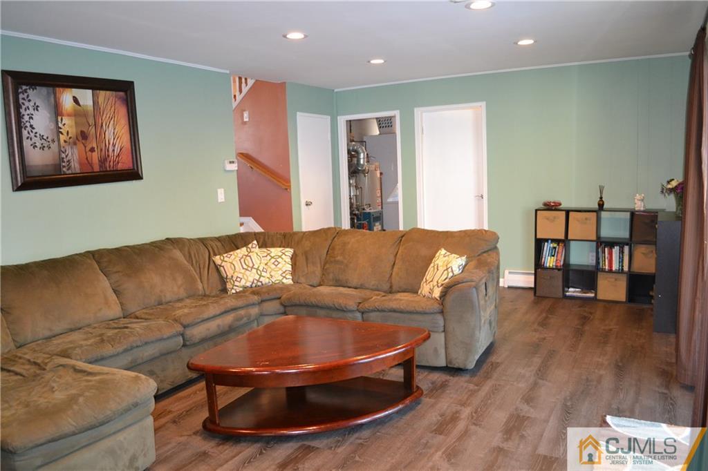 51 Eardley Road Edison, NJ 08817 - Photo 17 of 22 a living room with furniture and a wooden floor