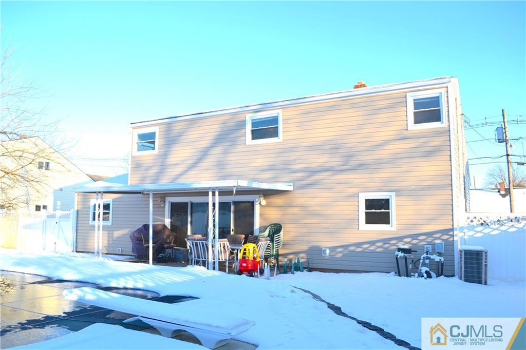 51 Eardley Road Edison, NJ 08817 - Photo 19 of 22 a view of a house with a patio