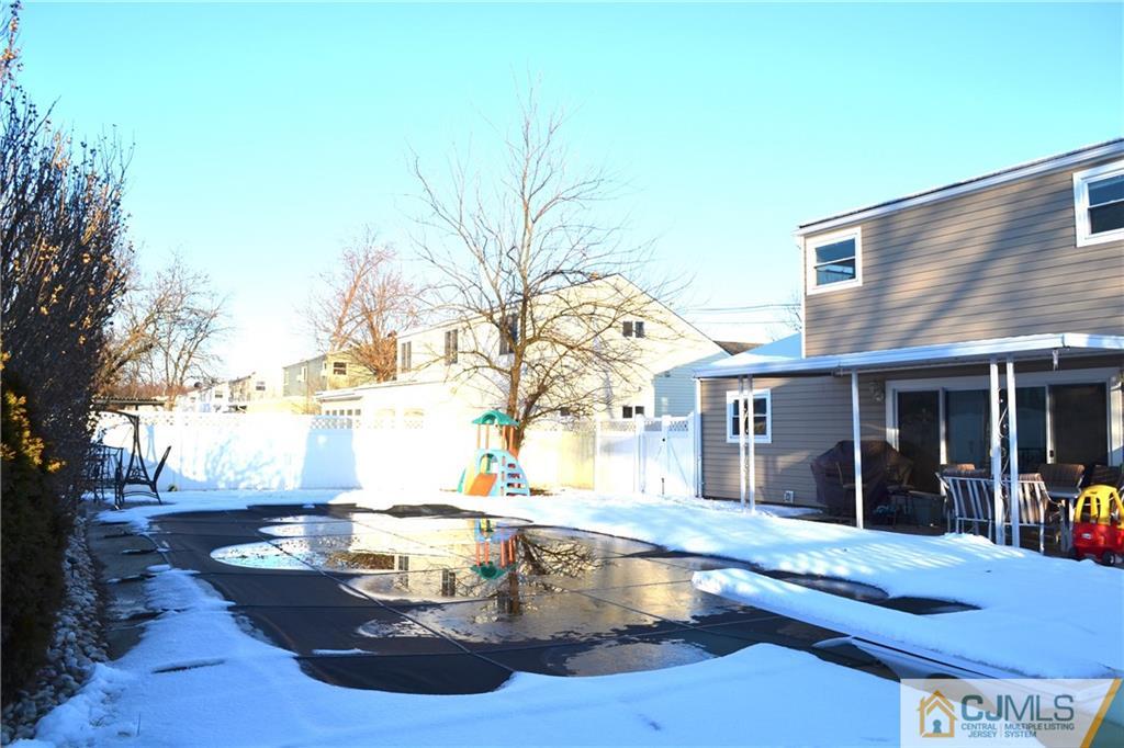 51 Eardley Road Edison, NJ 08817 - Photo 20 of 22 a view of a house with swimming pool