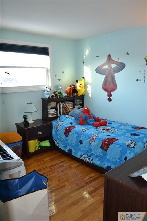51 Eardley Road Edison, NJ 08817 - Photo 10 of 22 a bed room with a window