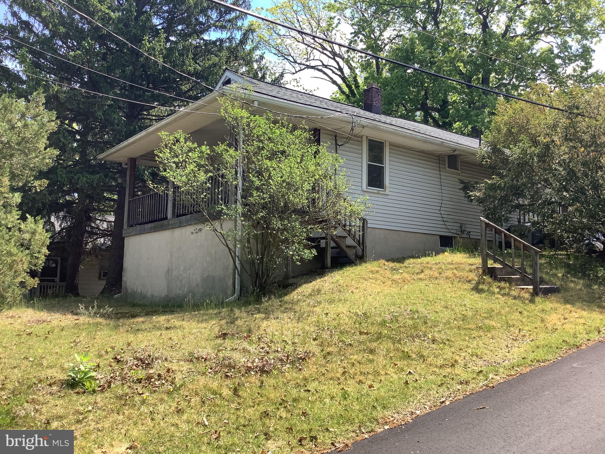 21 Davis Avenue Clementon, NJ 08021 - Photo 1 of 15 a view of a backyard of the house