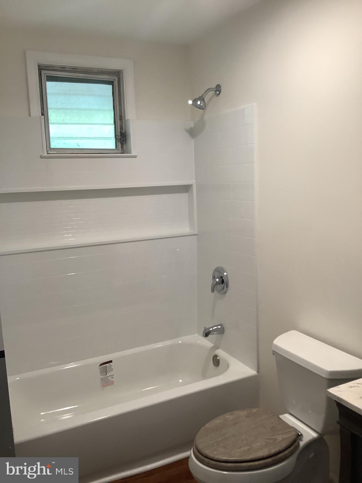21 Davis Avenue Clementon, NJ 08021 - Photo 11 of 15 a bathroom with a toilet a sink and bathtub