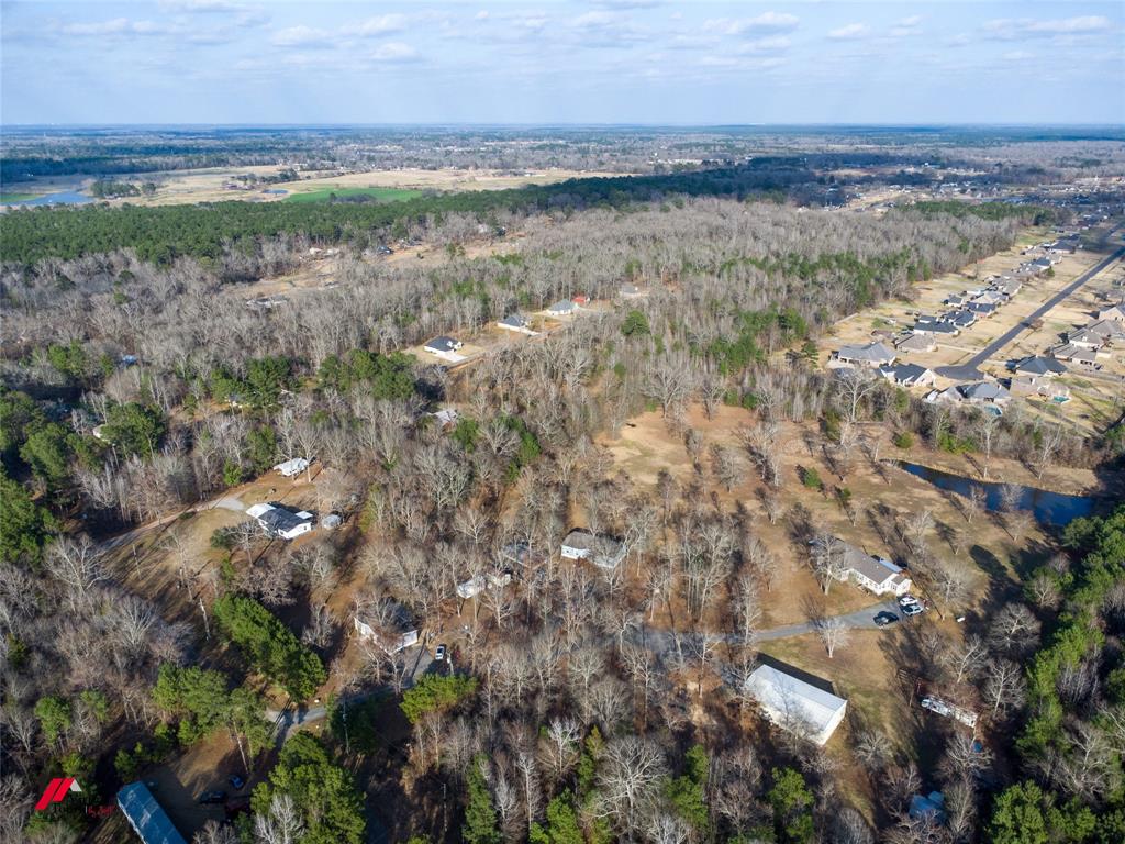 0 Voss Road Stonewall, LA 71078 - Photo 11 of 16 a view of a yard with an outdoor space