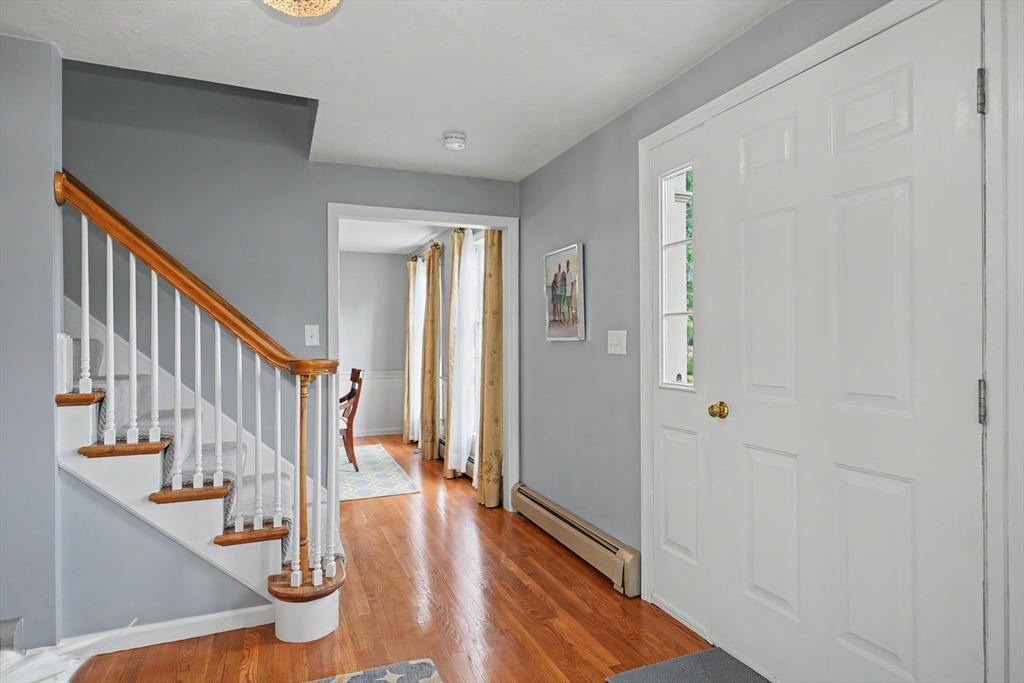 15 Lanthorn Road Northborough, MA 01532 - Photo 18 of 37 a view of entryway and hall with wooden floor