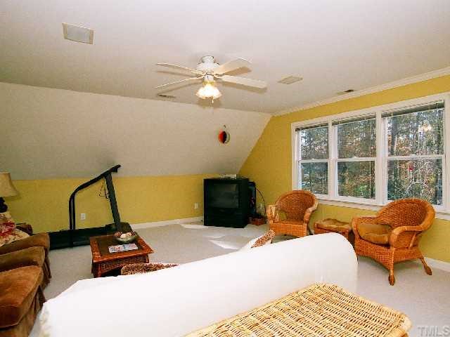 500 Wild Rose Court Raleigh, NC 27615 - Photo 10 of 12 a bedroom with furniture and a window