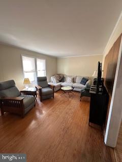 10116 Deal Island Road Deal Island, MD 21821 - Photo 12 of 30 a living room with furniture and a flat screen tv