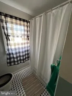 a view of a bathroom with a shower