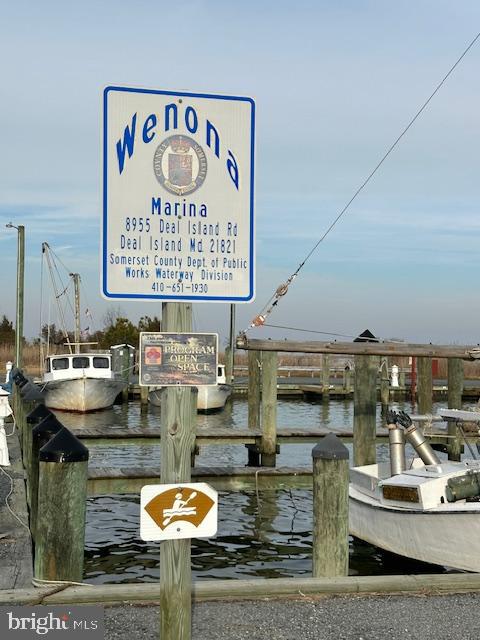 10116 Deal Island Road Deal Island, MD 21821 - Photo 28 of 30 a view of a kitchen with dining table and chairs