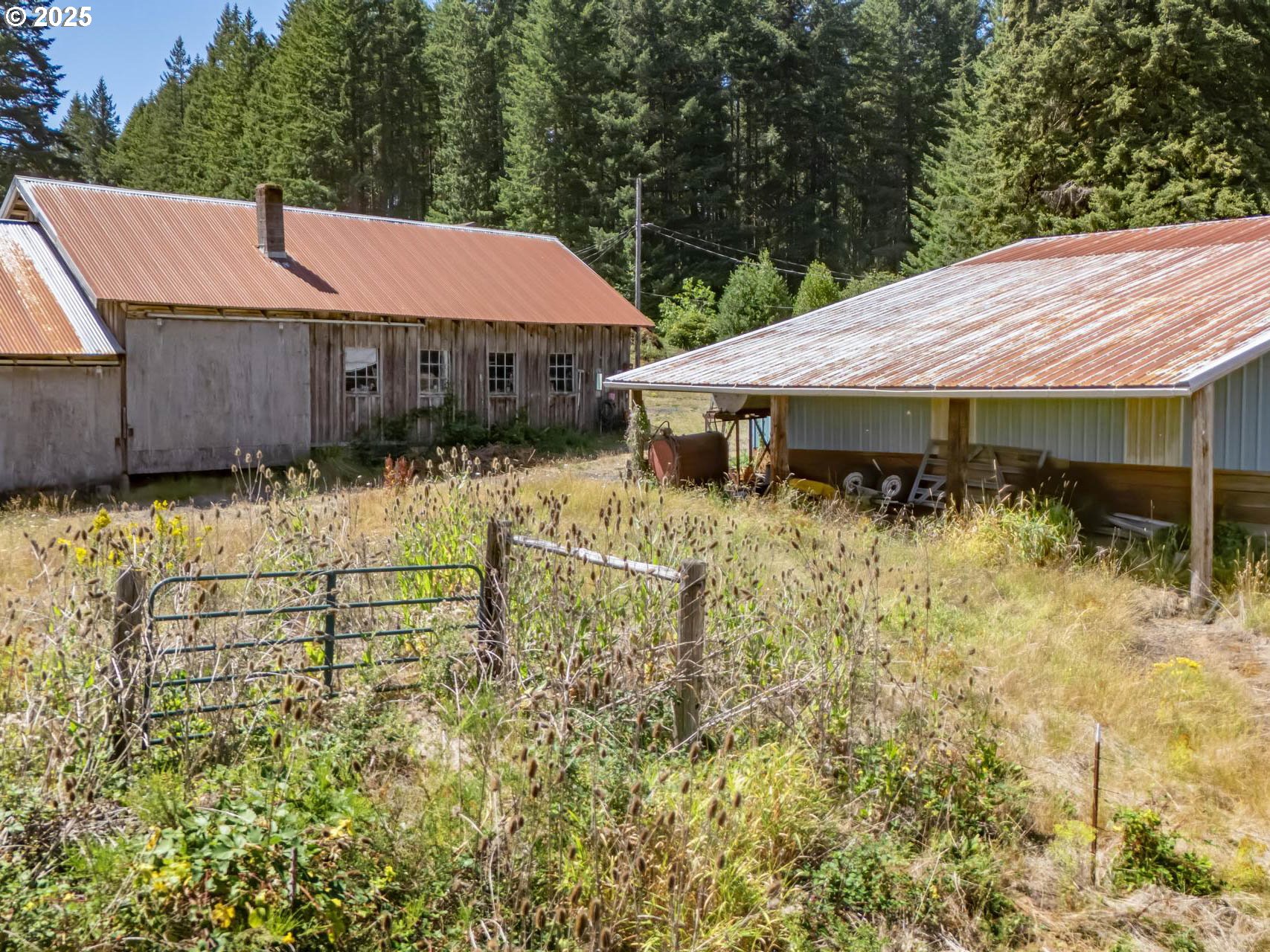 25420 Northwest Pumpkin Ridge Road North Plains, OR 97133 - Photo 31 of 41 a aerial view of a house with a yard