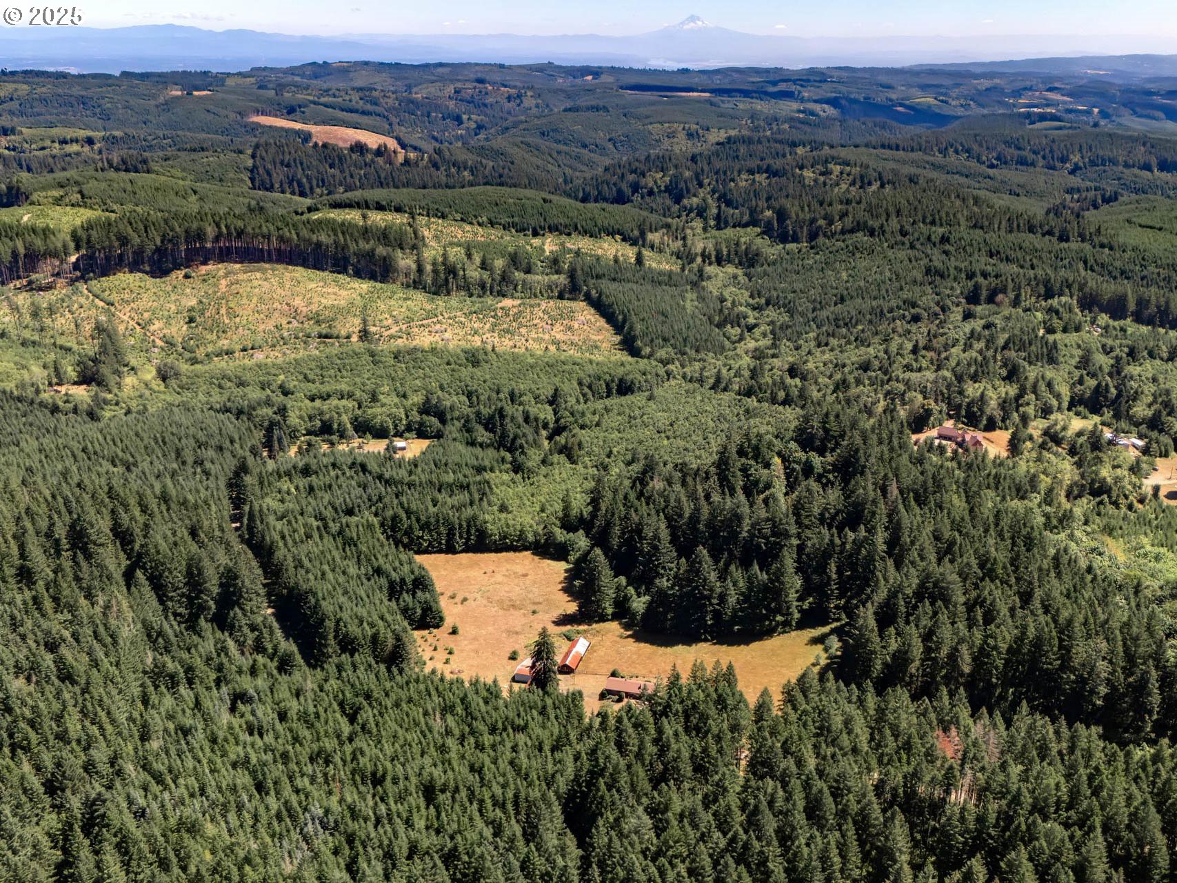 25420 Northwest Pumpkin Ridge Road North Plains, OR 97133 - Photo 36 of 41 an aerial view of residential house with an outdoor space and seating