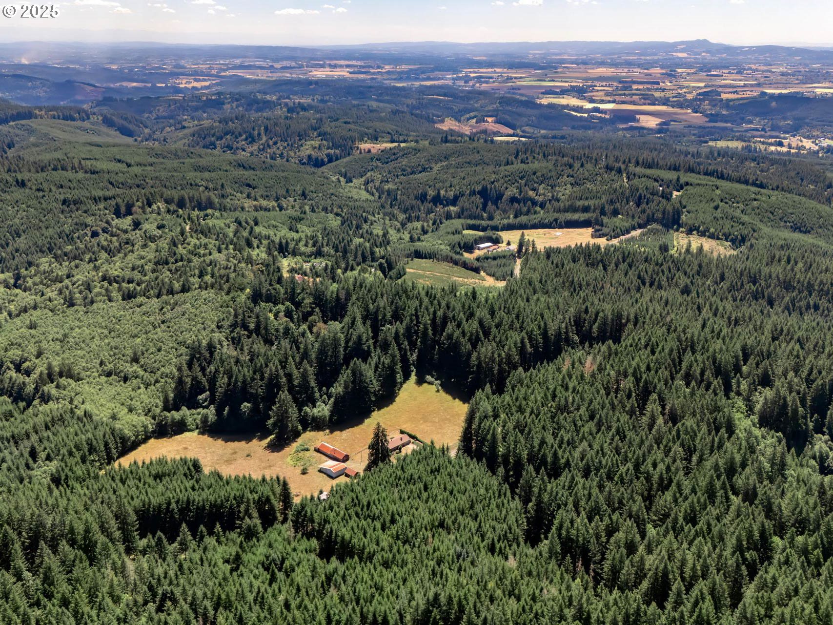 25420 Northwest Pumpkin Ridge Road North Plains, OR 97133 - Photo 37 of 41 an aerial view of mountain with residential house