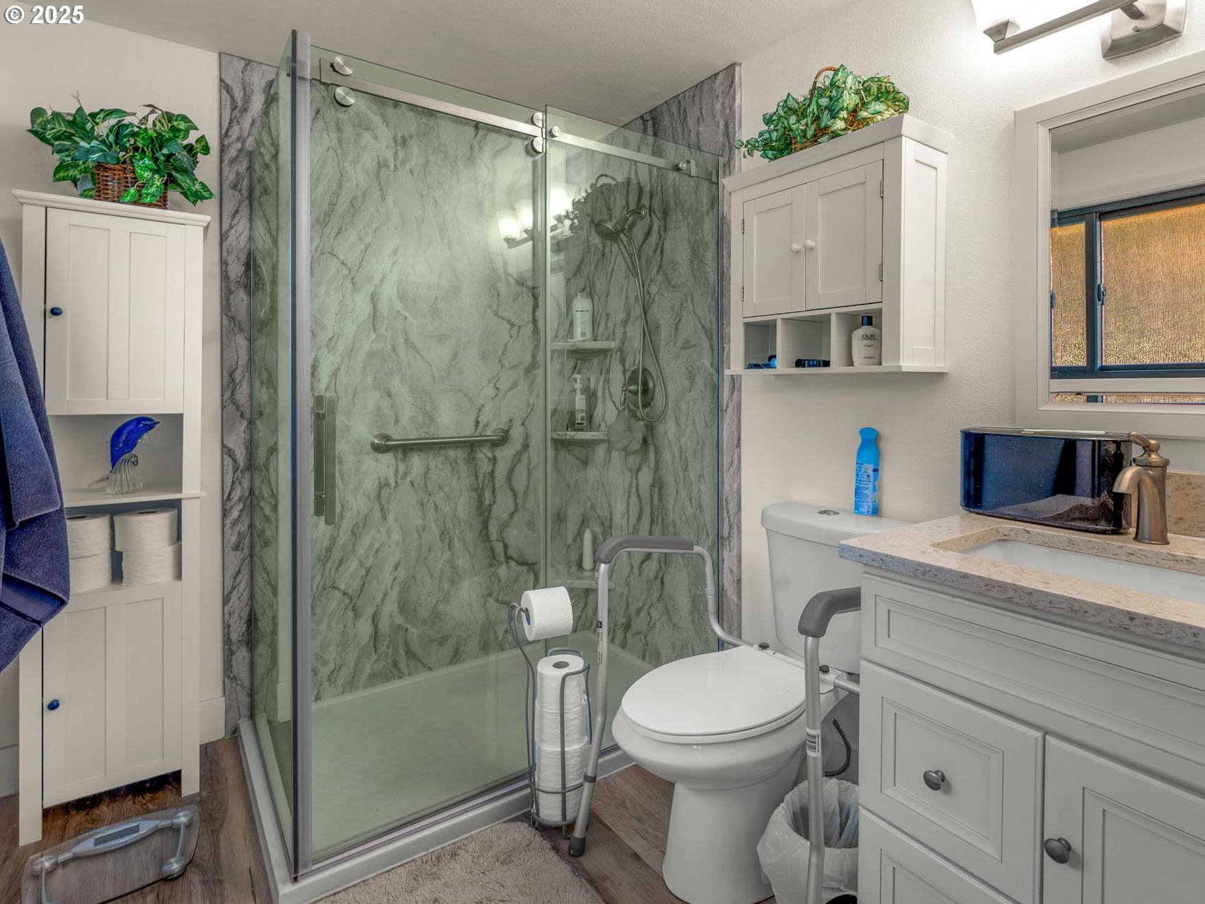 25420 Northwest Pumpkin Ridge Road North Plains, OR 97133 - Photo 9 of 41 a bathroom with a sink a toilet and shower