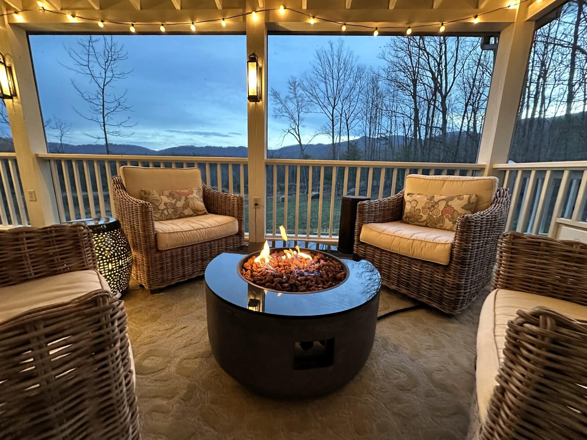 5464 Ridgelea Estates Drive Roanoke, VA 24018 - Photo 21 of 85 a view of a two chairs in the back yard of the house