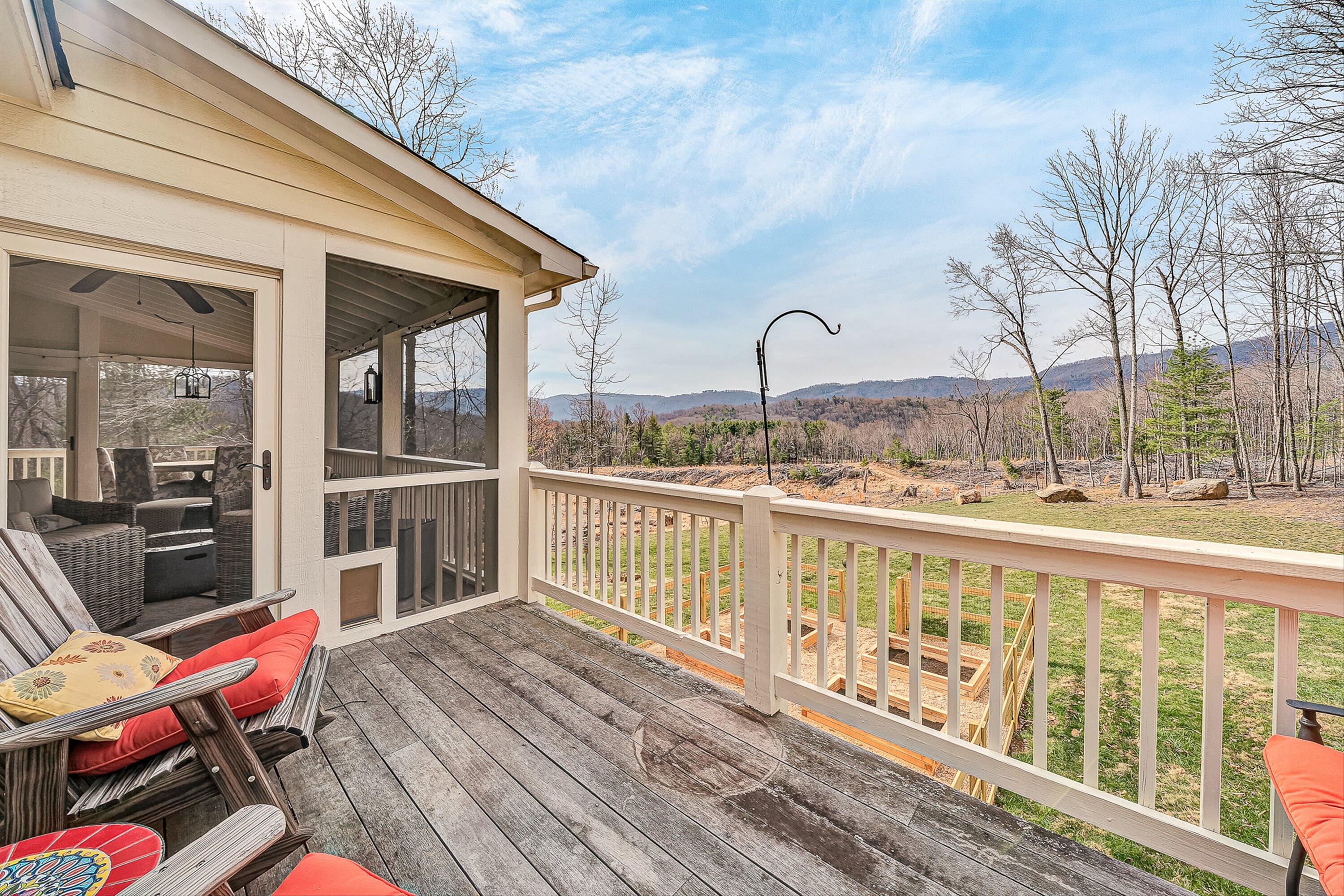 5464 Ridgelea Estates Drive Roanoke, VA 24018 - Photo 23 of 85 a view of a balcony with chairs and wooden floor
