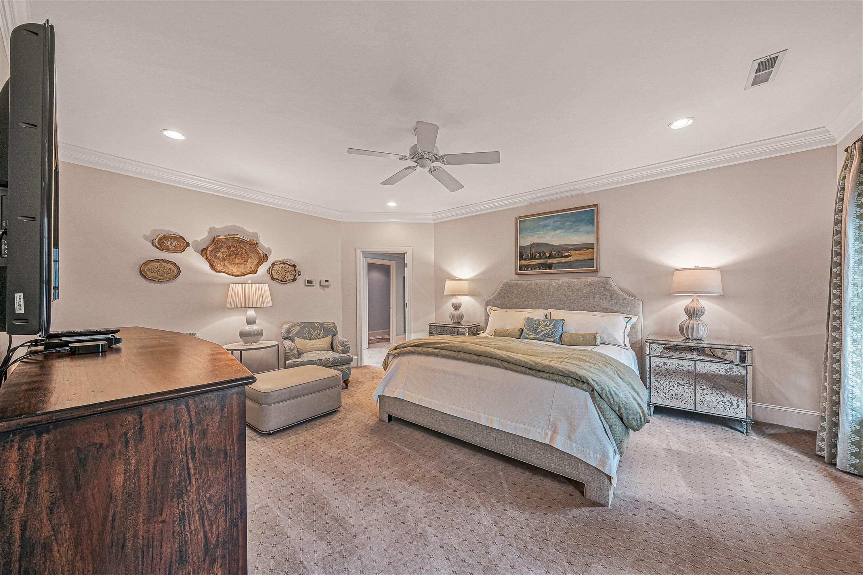 5464 Ridgelea Estates Drive Roanoke, VA 24018 - Photo 44 of 85 a spacious bedroom with a bed and a chandelier