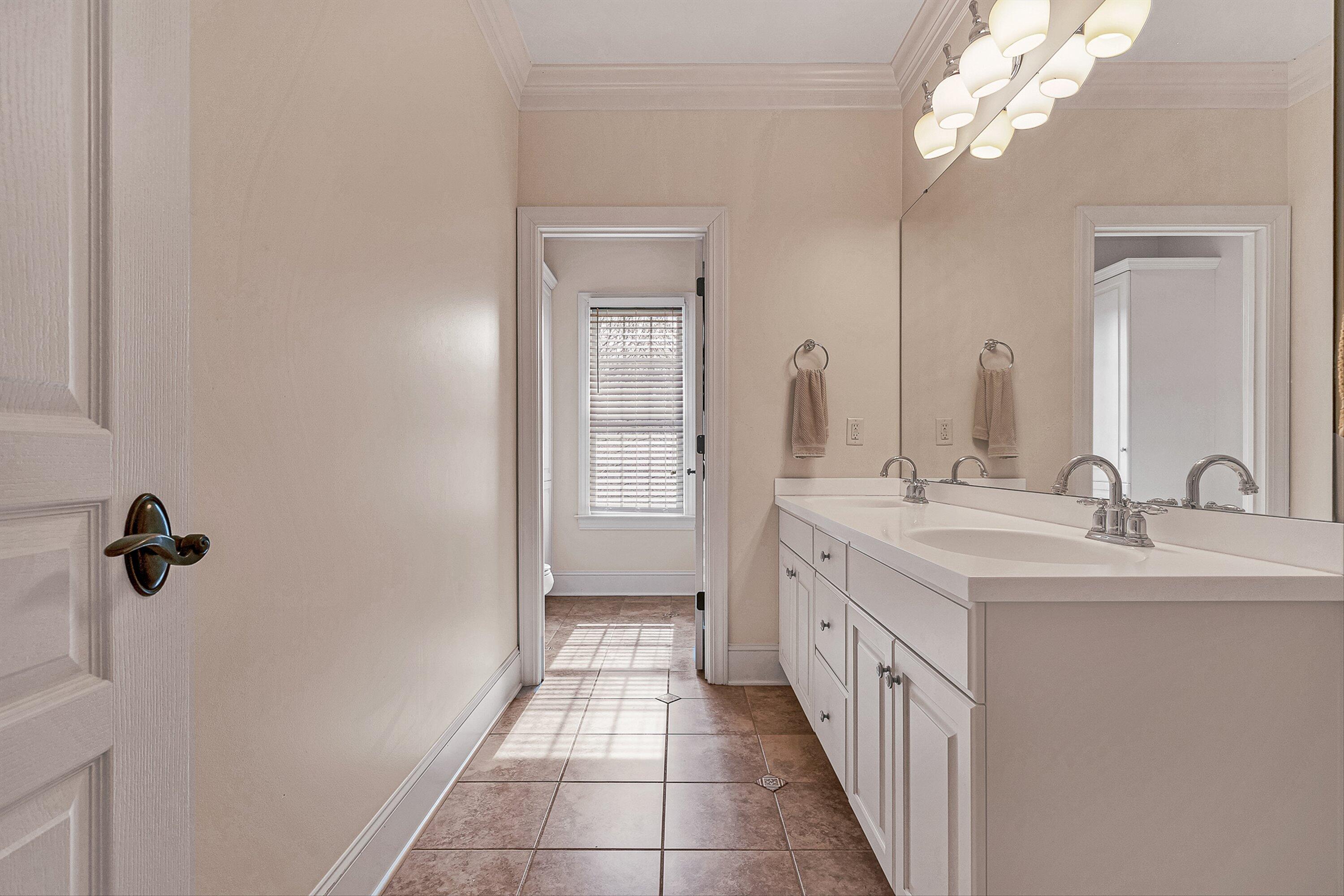 5464 Ridgelea Estates Drive Roanoke, VA 24018 - Photo 57 of 85 a bathroom with a double vanity sink a and a mirror