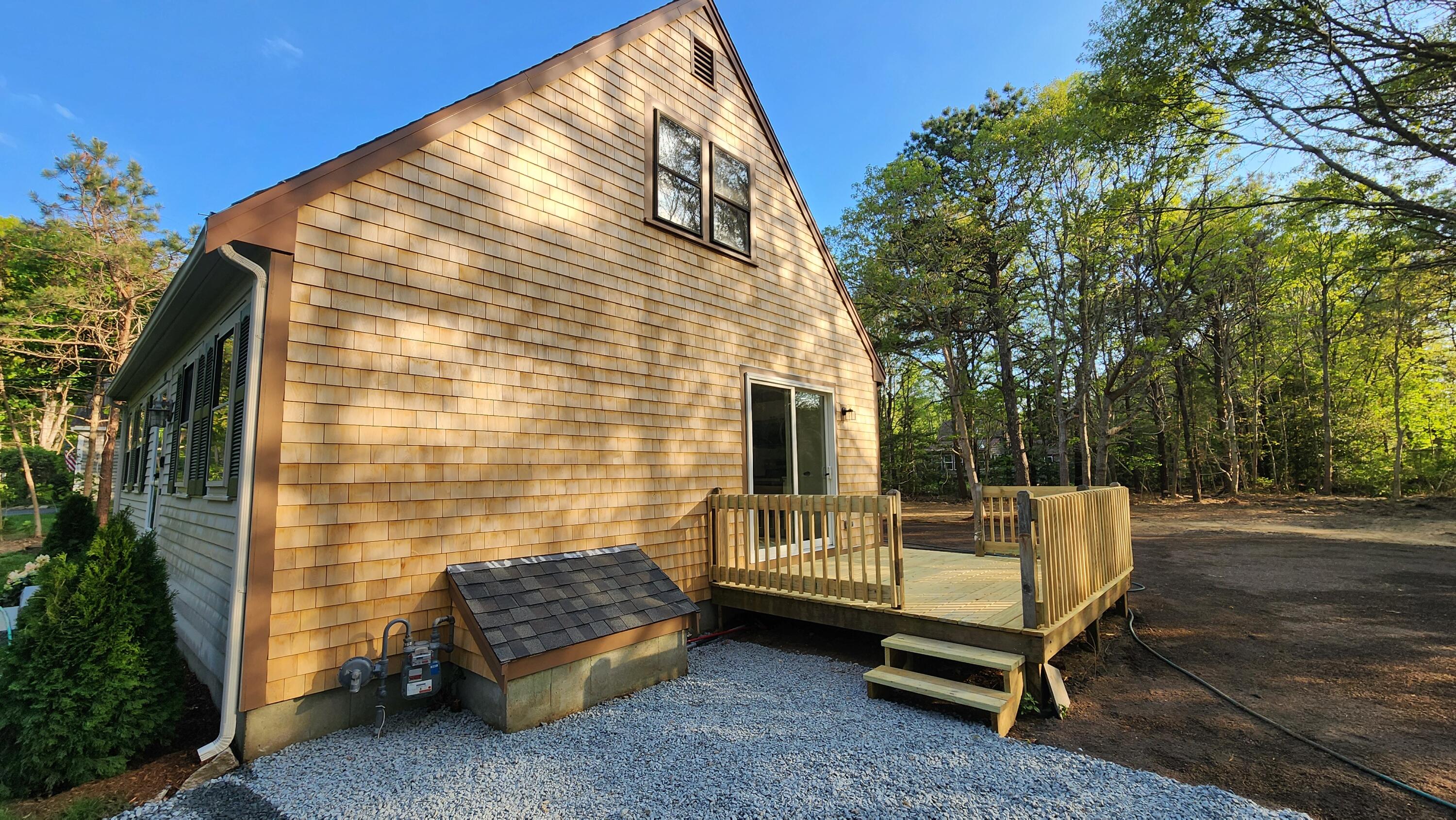 147 Chippingstone Road Marstons Mills, MA 02648 - Photo 16 of 23 a view of a chair in the patio