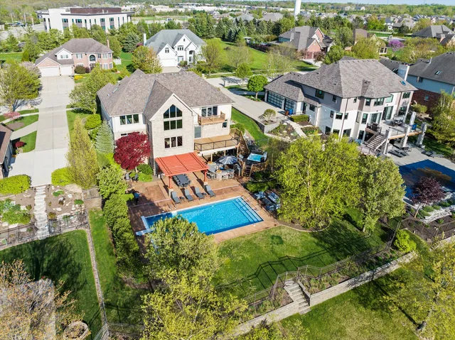 a view of balcony with a dining space and wooden floor