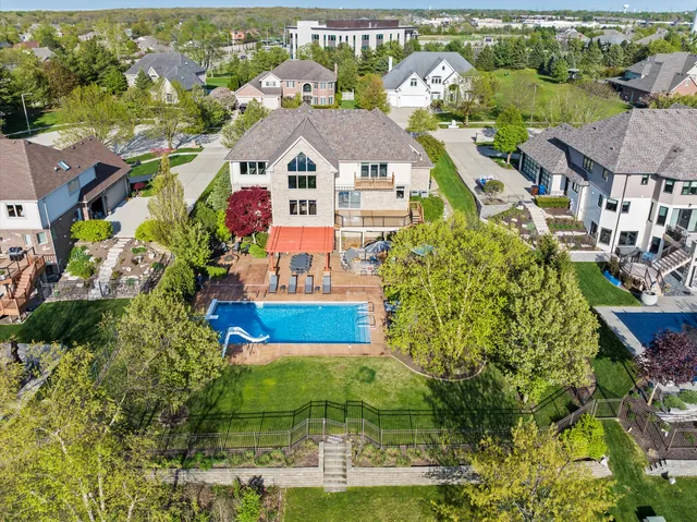 a view of a balcony with wooden floor and outdoor space