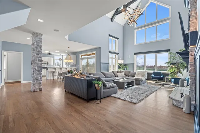 a large bathroom with a large tub and sink