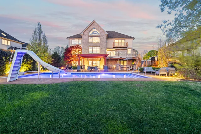 a view of a swimming pool with a patio