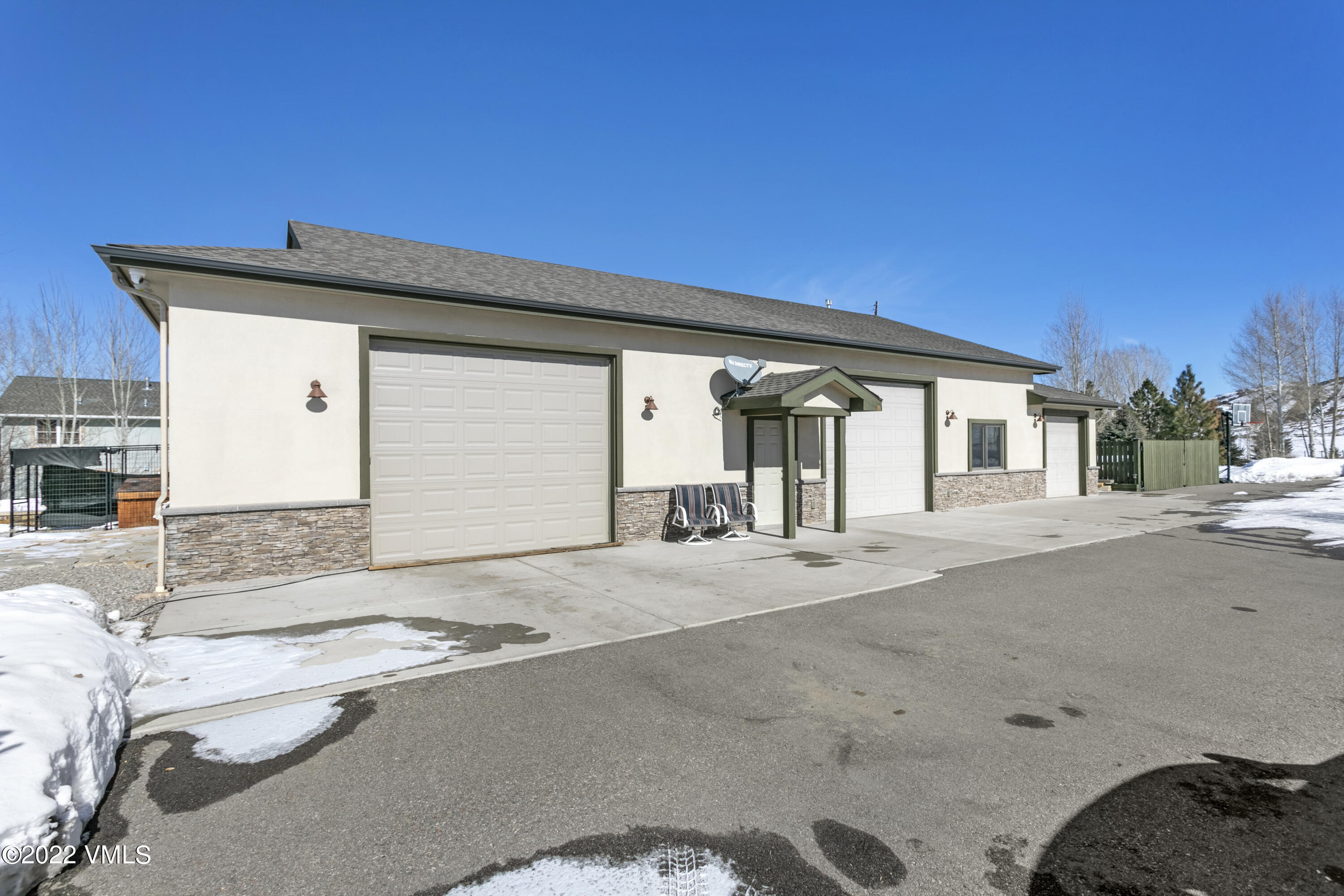 50 Cottonwood Pass Road Gypsum, CO 81637 - Photo 2 of 33 a front view of a house with a outdoor space