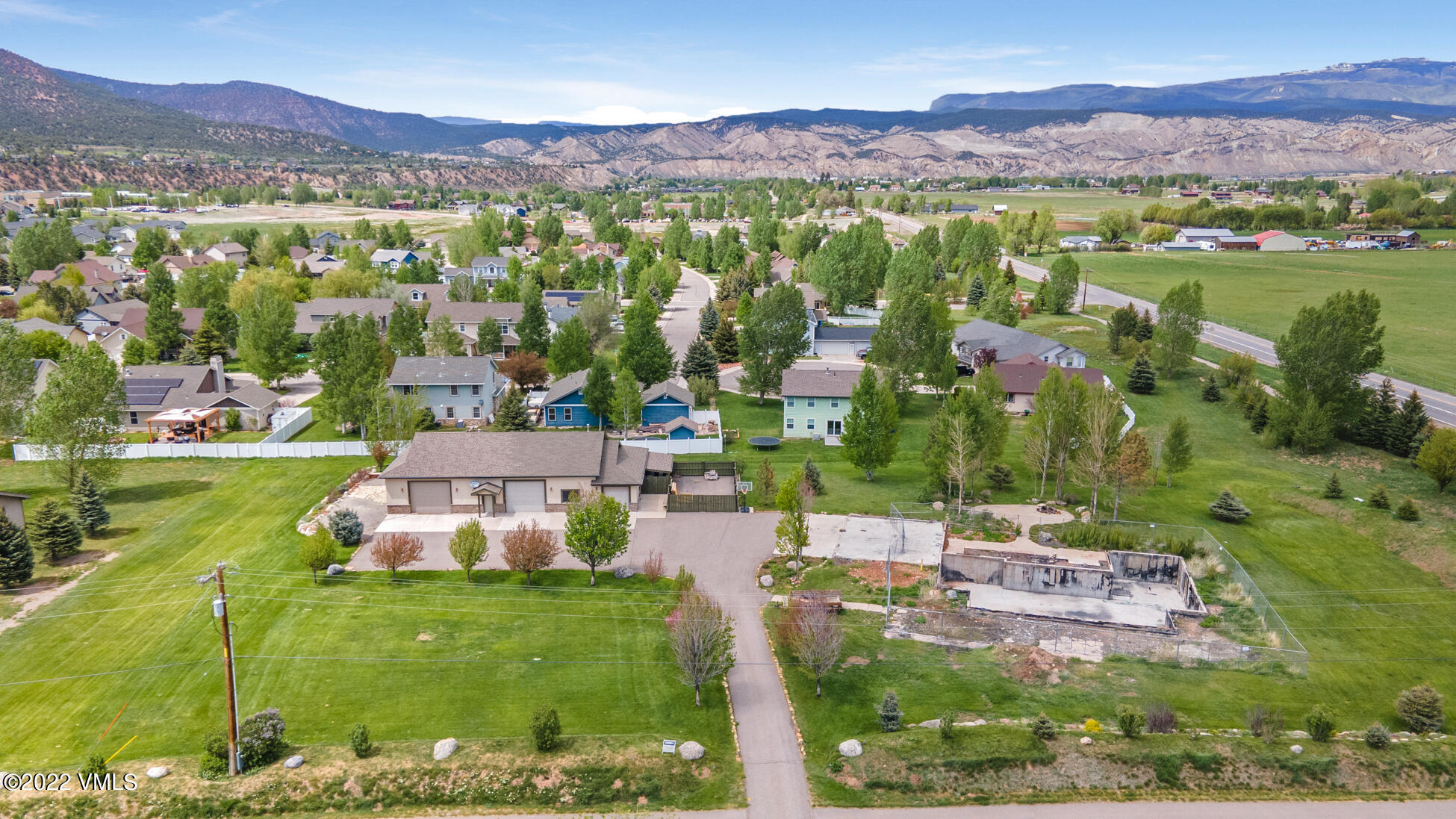 50 Cottonwood Pass Road Gypsum, CO 81637 - Photo 32 of 33 a view of a city with mountains in the background